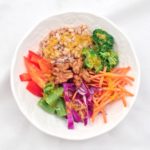 Farro crunch bowl with orange dijon vinaigrette